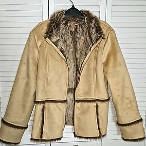 i.e. relaxed Faux fur zippered jacket.  JUNIOR LARGE